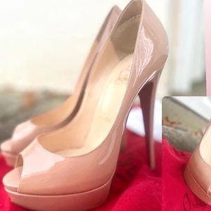 Nude patent leather Louboutin peep toe heels